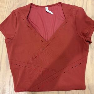 Athleta It’s a Wrap Salutation Tee cropped top red/orange mesh back
